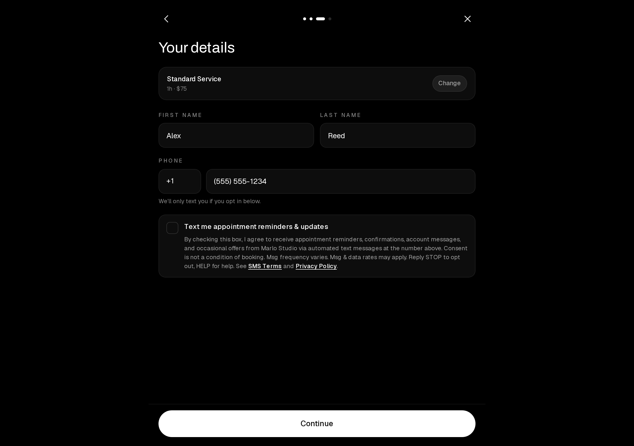Booking details step showing the phone number field and the unchecked SMS consent checkbox with its full disclosure text